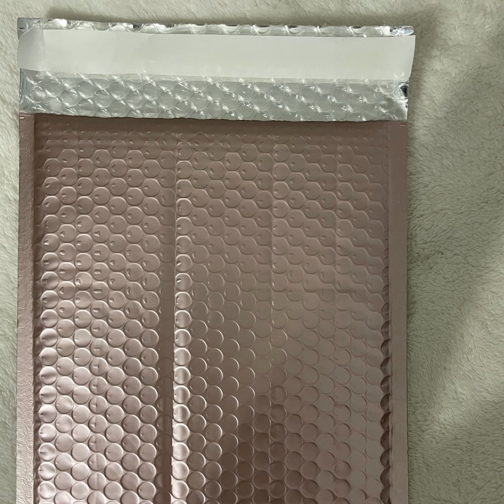 Rose gold shipping envelopes